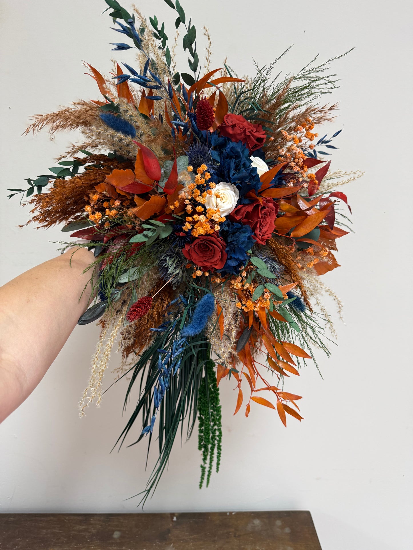 Autumn Cascading Wedding Bouquet β Rust, Orange, Terracotta & Navy Blue Dried Flowers